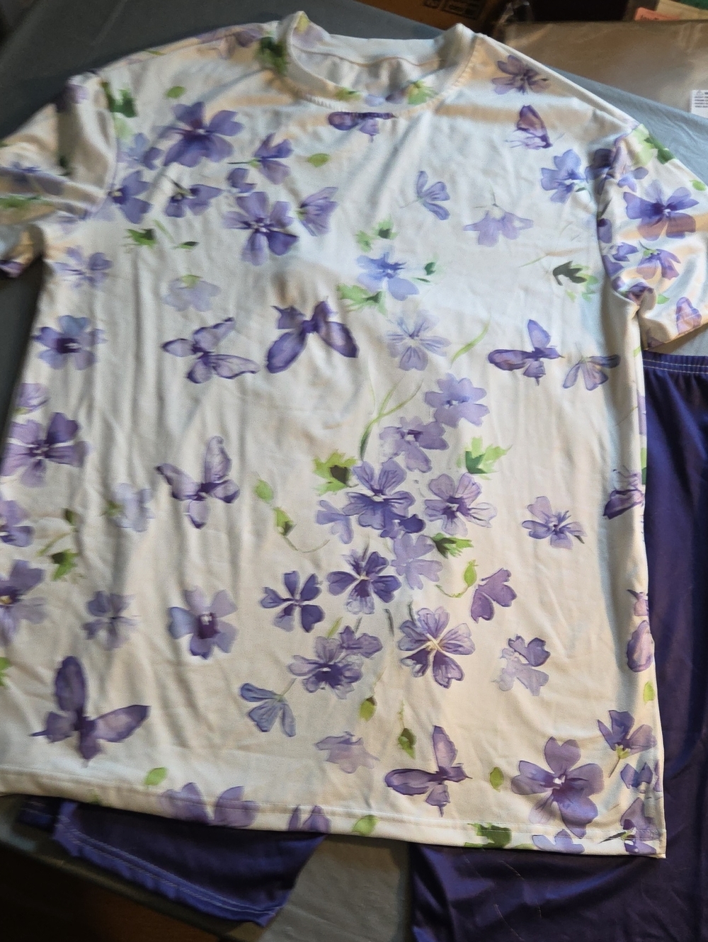 Womans Floral Short Sleeve Top With Matching Shorts in Lavender And Purple.
